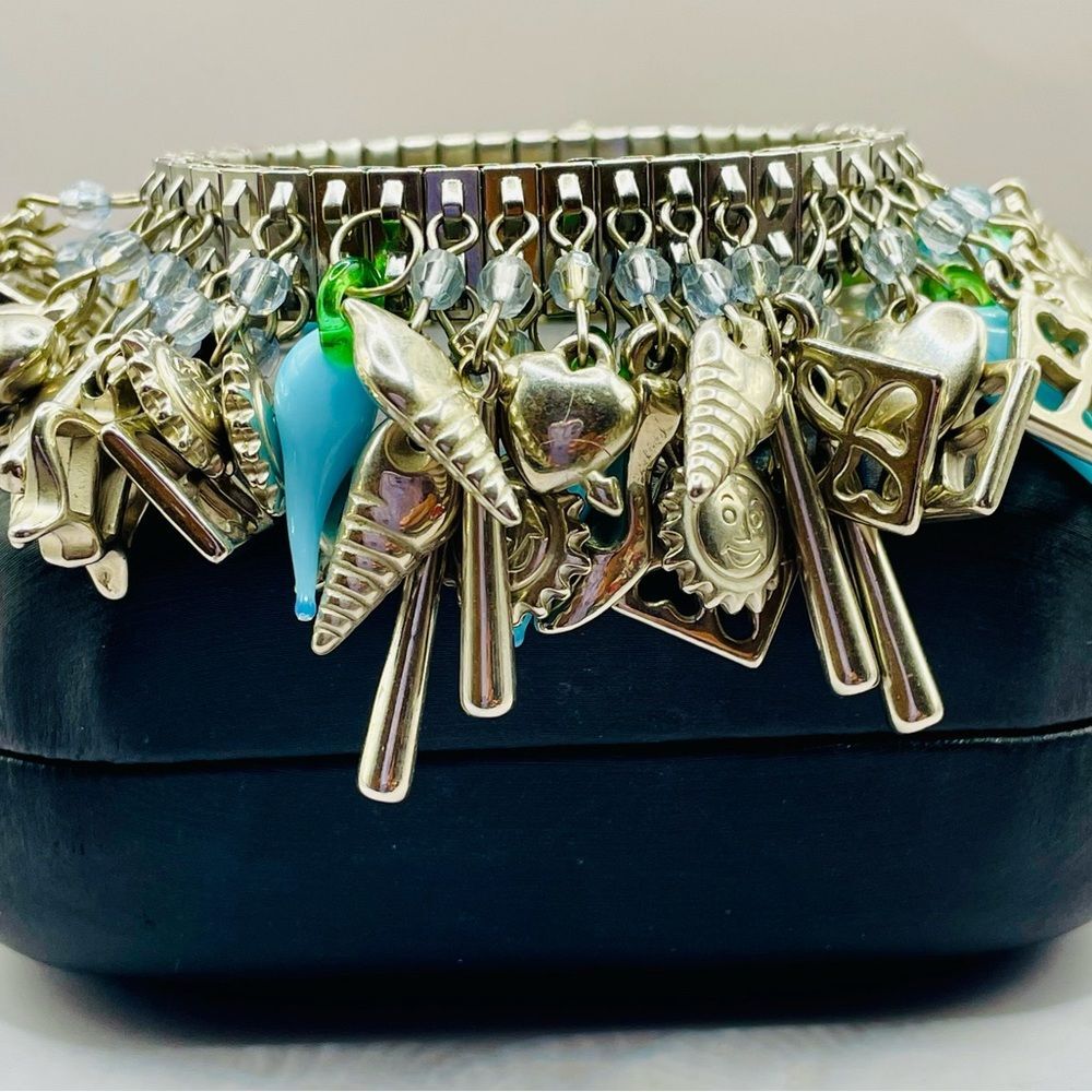Silver Tone Cha Cha Charm Bracelet w/Blue peppers, sun, heart, and shell charms